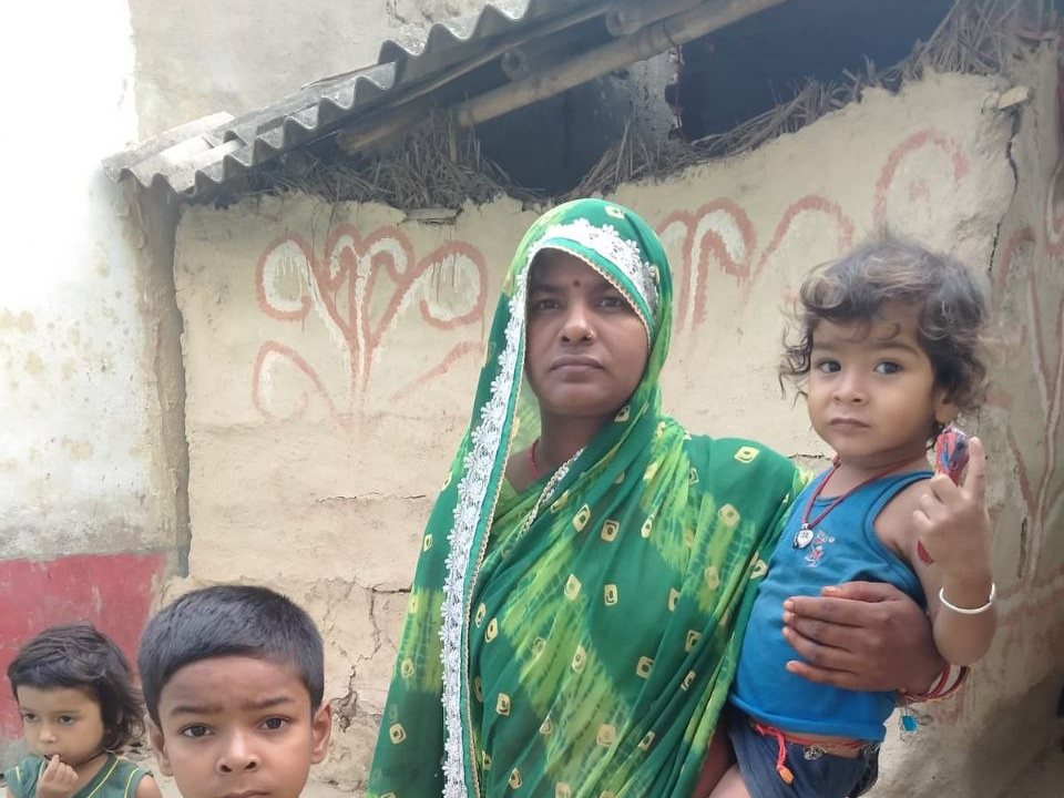 A mother and her children in a village Meraki Manthan works with